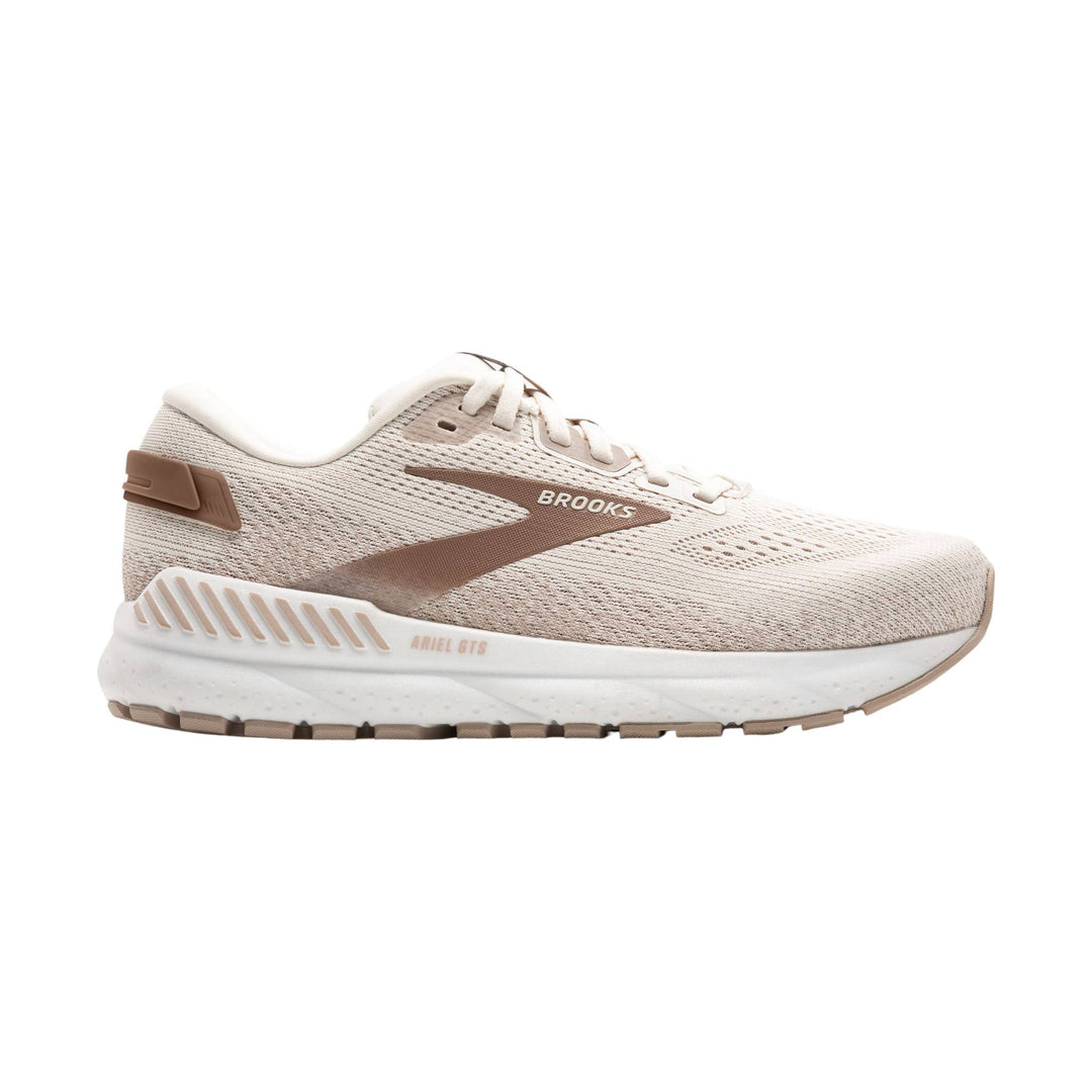 Light beige and brown running shoe with white midsole and visible Brooks logo