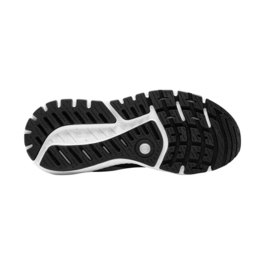 Black and white trail-running shoe sole with deep tread and Brooks branding