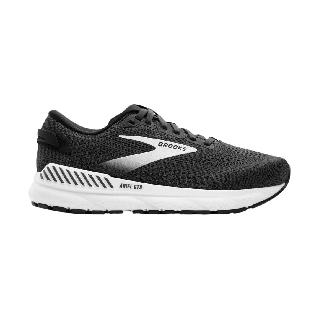 Black running shoe with white midsole and Brooks branding, side view