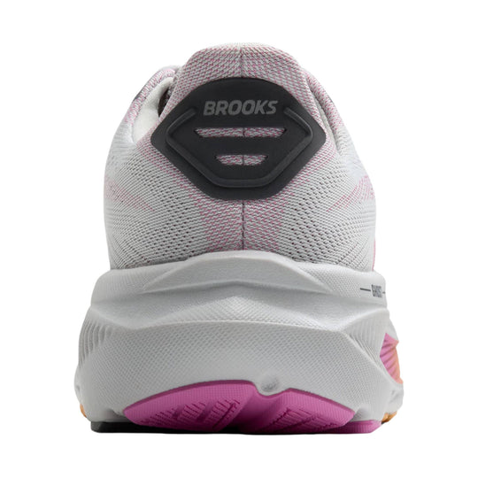 White running shoe heel view with pink accents and a black Brooks heel tab