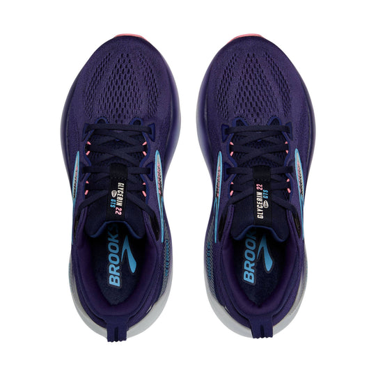 Purple running shoes with black laces and blue branding, shown from above