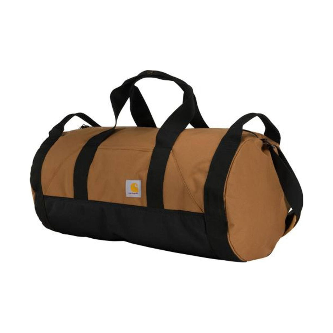 Tan and black round duffel bag with top handles and shoulder strap