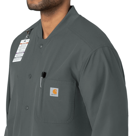 Dark gray button-front scrub coat with chest pockets and Carhartt patch on the pocket