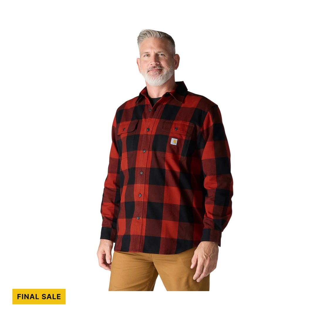 Red and black plaid button-up shirt with chest pockets on a model