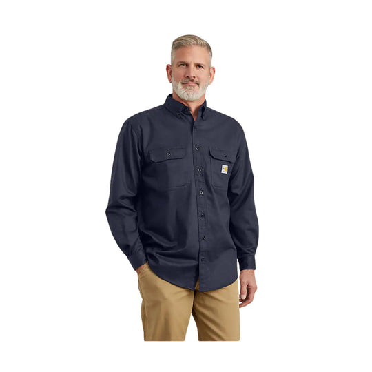 Dark navy long-sleeve button-up work shirt with two chest pockets and tan pants