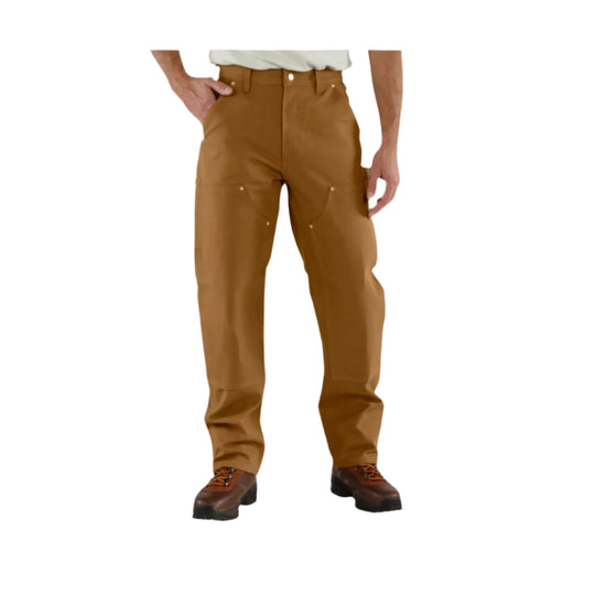 Brown work pants with reinforced front panels and brown work boots