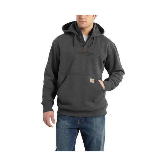 Person wearing a dark gray hoodie and blue jeans on a white background