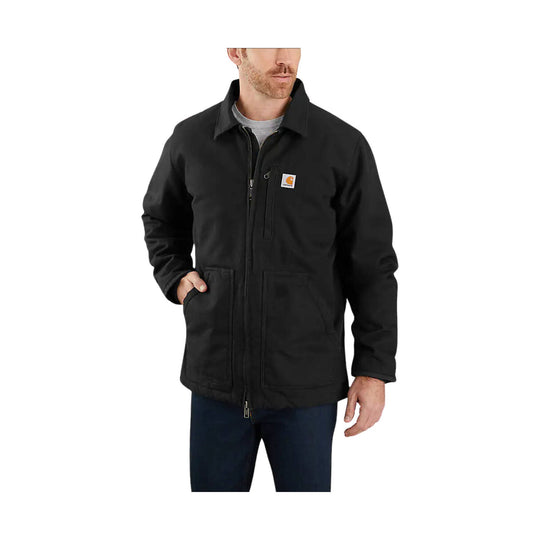 Black zip-front jacket with chest logo patch, large front pockets, and a sherpa collar