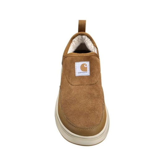 Tan suede slip-on shoe with faux shearling lining, pull tab, and white sole