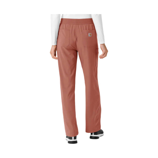 Rust-colored straight-leg scrub pants with elastic waistband and front and back pockets, shown from the back