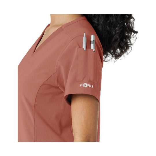 Rose women’s scrub top with V-neck, chest pocket, and sleeve pen pocket