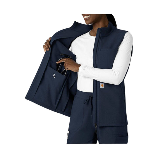 Navy zip-front fleece vest with a stand collar and chest pocket, worn over a white long-sleeve shirt