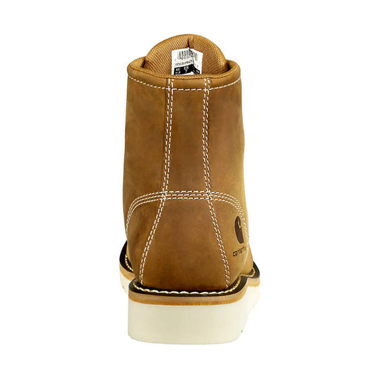 Brown ankle work boot viewed from the back, with white stitching, a white wedge sole, and a Carhartt logo on the heel