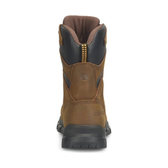 Rear view of a brown and black work boot with a thick lug sole and pull tab