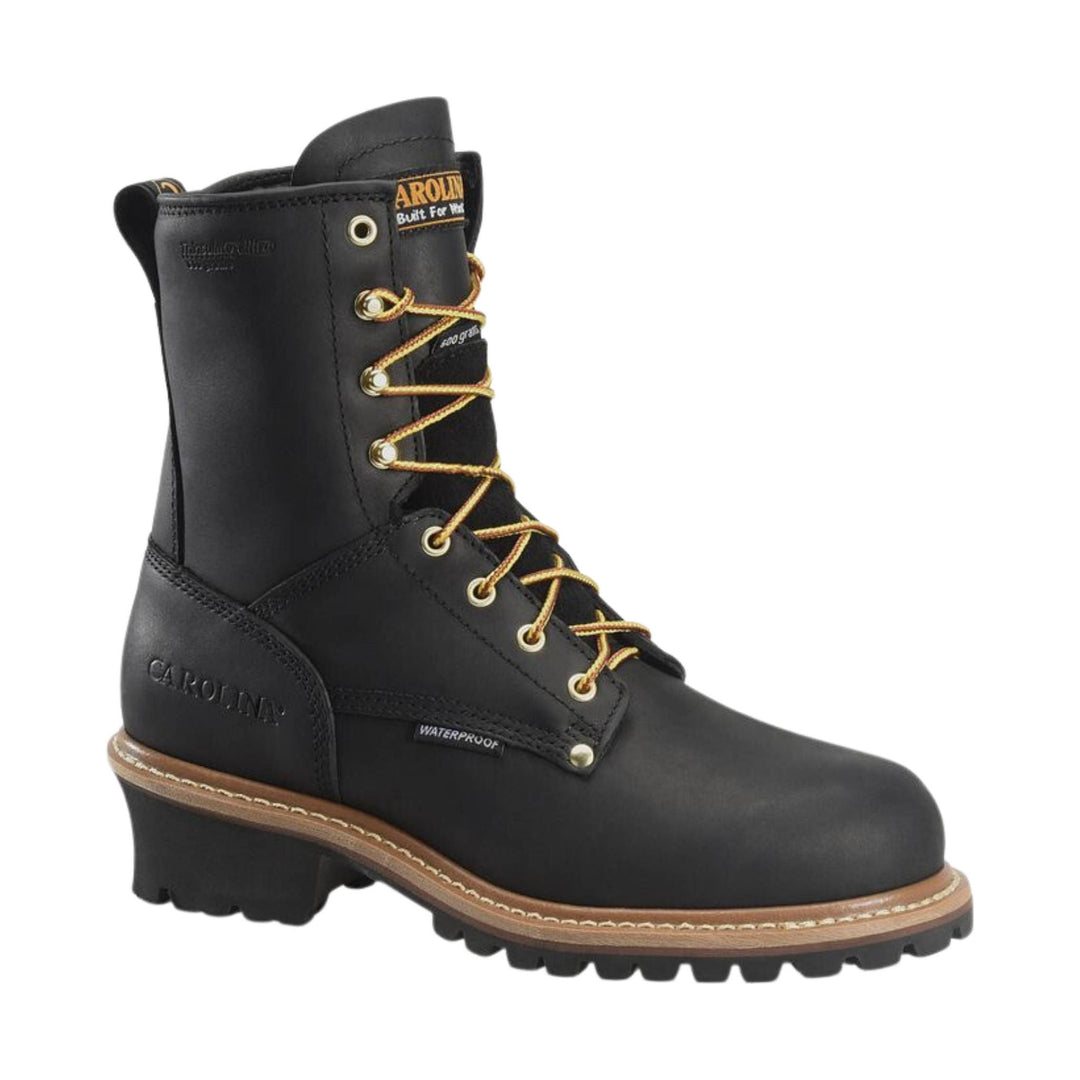 Black boot with gold laces on a white background