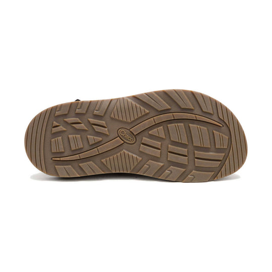 Brown outsole of a Chaco clog with a centered logo and deep tread pattern