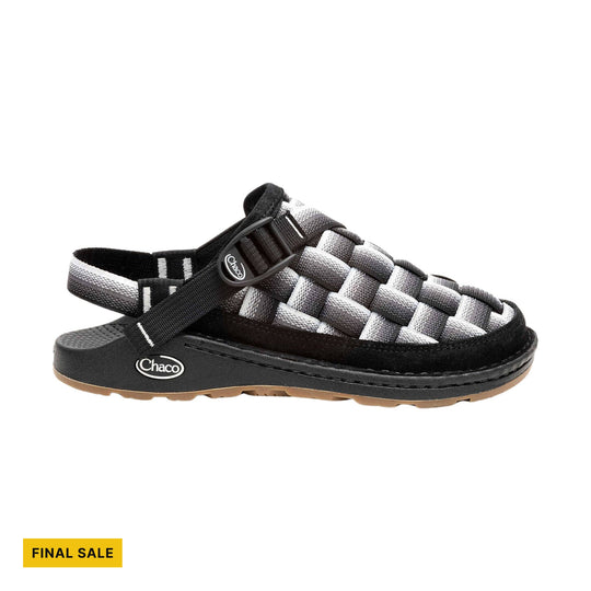 Woven closed-toe sandal with black, white, and gray straps, buckle closure, and tan sole