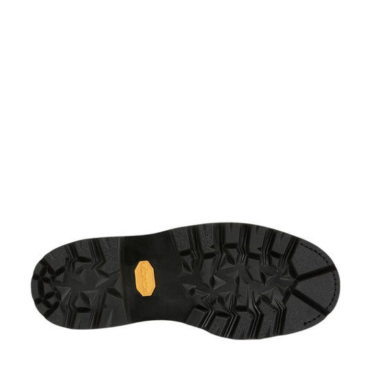 Black boot outsole with rugged lug tread and yellow logo insert