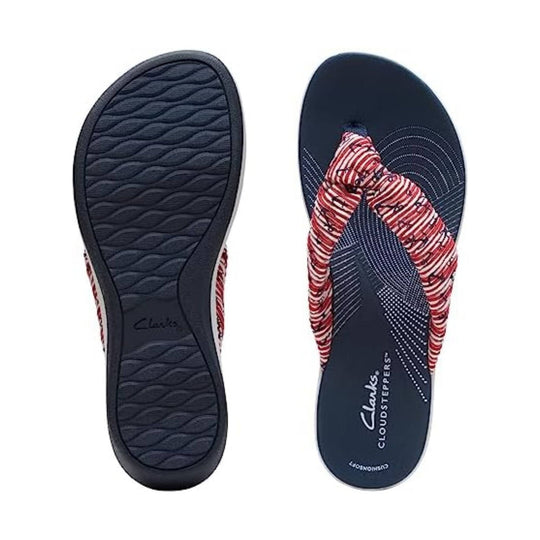 Red, white, and navy thong sandal with striped straps and cushioned footbed, shown top and sole views