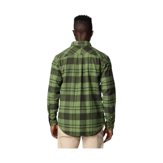 Green and black plaid long-sleeve flannel shirt shown from the back