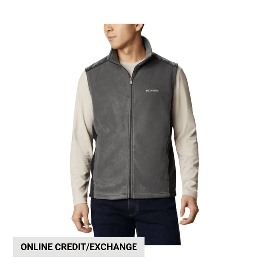 Gray zip-up fleece vest worn over a beige long-sleeve shirt, with a small Columbia logo on the chest