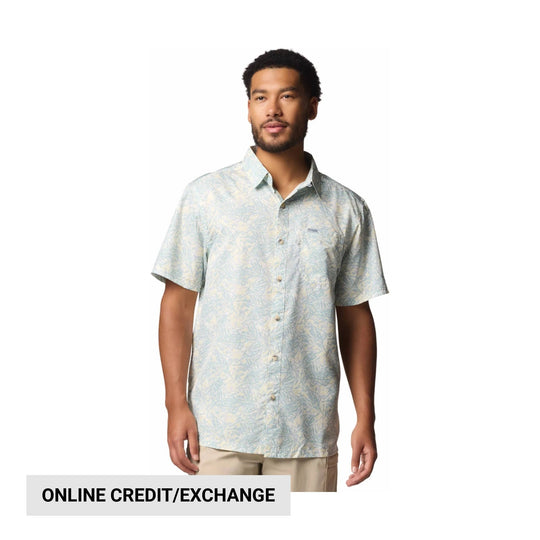 Light blue short-sleeve button-up camp shirt with a subtle tropical leaf print