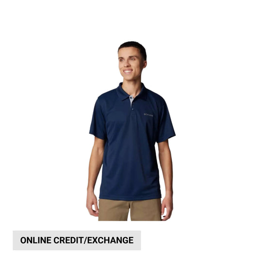 Man wearing a navy short-sleeve polo shirt with a small chest logo