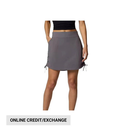Gray athletic skort with drawstring side ties, worn with a black crop top