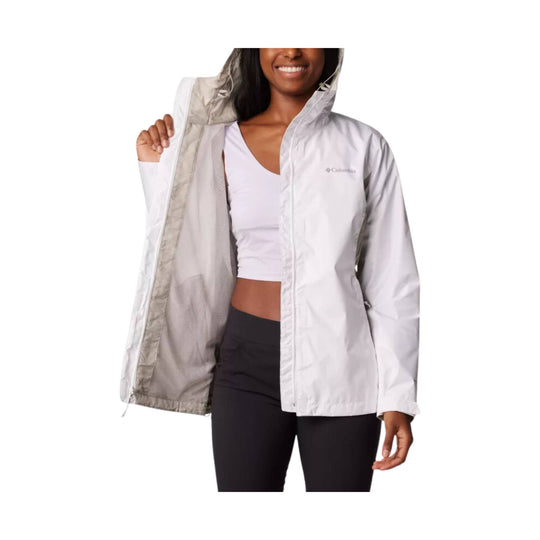 White hooded rain jacket with light gray lining, open to show a white crop top and black leggings