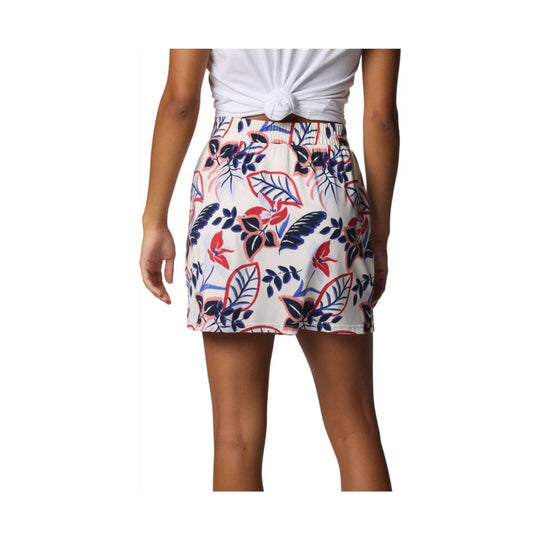 White printed skort with red, navy, and pink tropical floral pattern, shown from the back