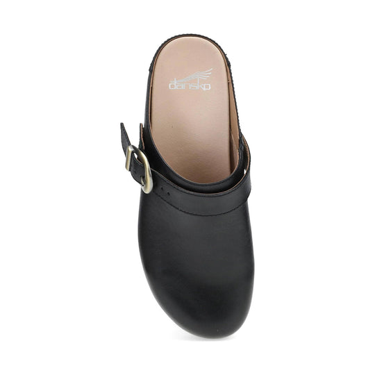 Black leather mule clog with an ankle strap and metal buckle, top view