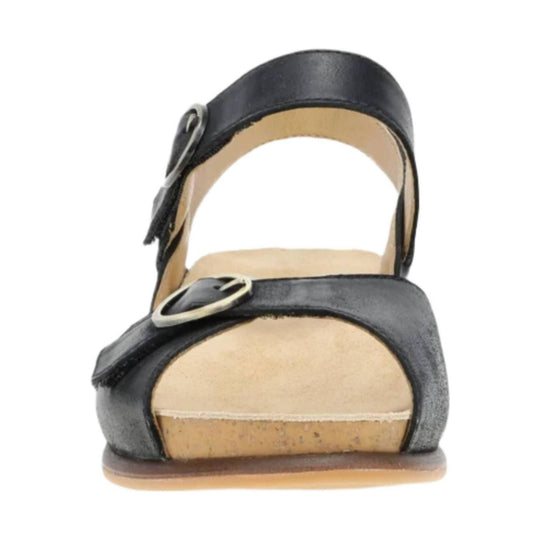 Black sandal with two buckled straps and a cork footbed, shown from the front