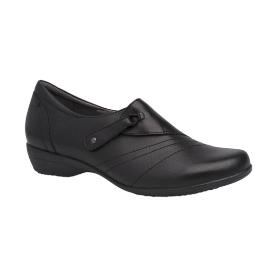 Black slip-on shoe with a low wedge heel and side strap detail