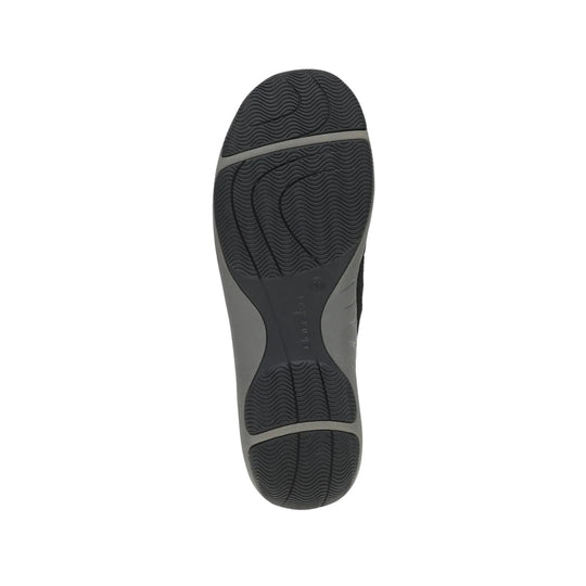 Black and gray sneaker outsole with wavy tread pattern