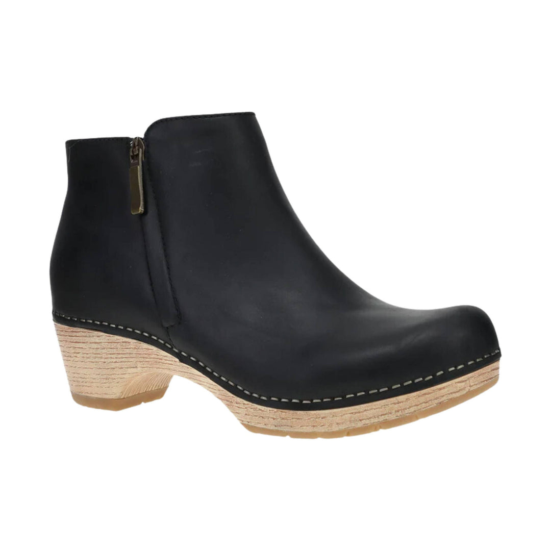 Black ankle boot with side zipper, stacked wood-look heel, and round toe