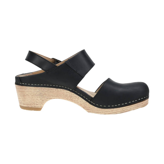 Black closed-toe wedge sandal with ankle strap and wood-look heel