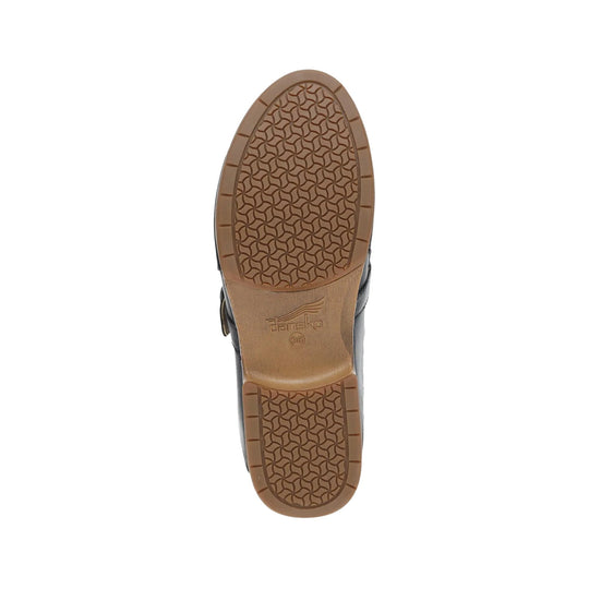 Brown treaded shoe sole with Dansko logo and size 38 stamped near the heel