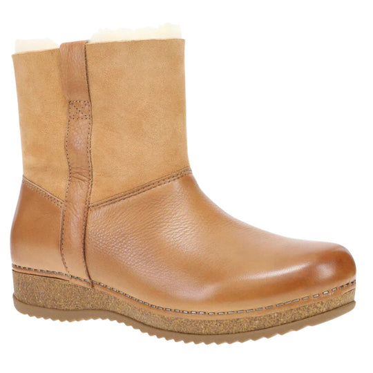 Tan pull-on ankle boot with a smooth toe, suede shaft, and cork wedge sole