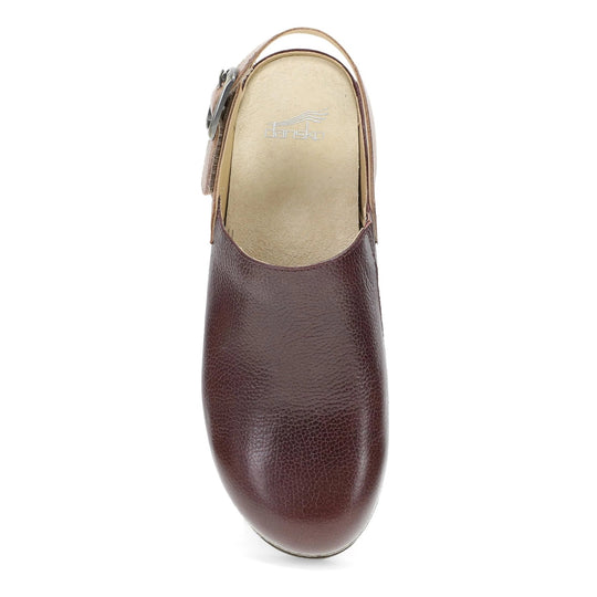 Brown leather clog-style shoe with an open back and visible Dansko insole logo
