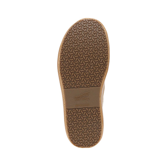 Brown slip-resistant shoe sole with embossed tread and Dansko logo