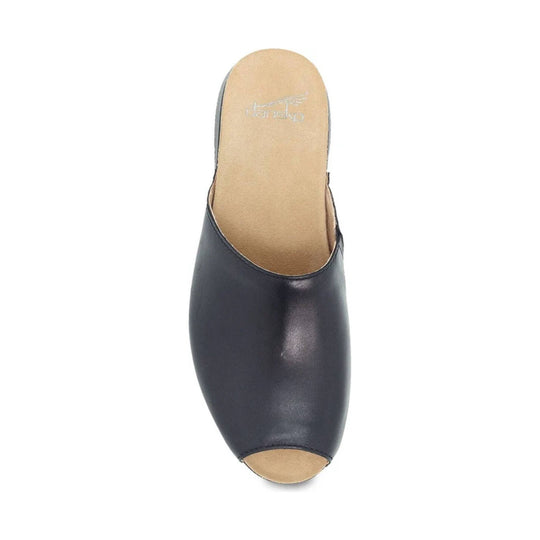 Black open-toe mule clog with tan footbed and low heel, top view