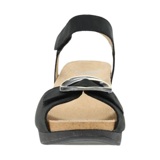 Black platform sandal with cork footbed, wide toe strap, silver buckle, and ankle strap