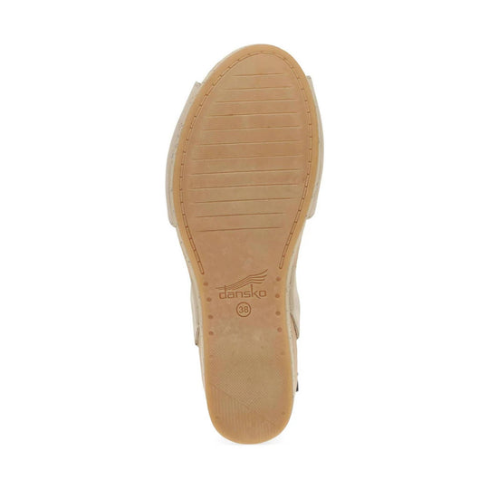 Tan sandal sole with Dansko logo and size 38 marking