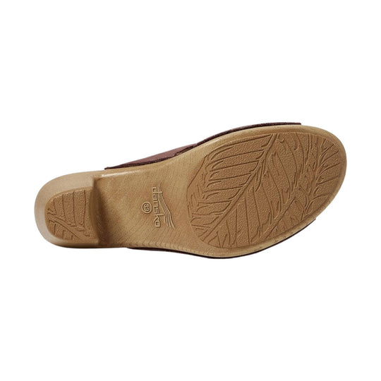 Brown sandal with a textured tan outsole shown from the bottom