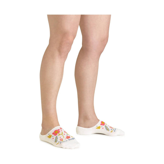 White no-show socks with colorful floral pattern and visible Darn Tough text