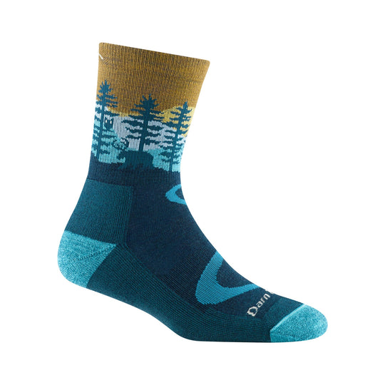 Teal and navy hiking sock with a forest scene pattern and visible Darn text near the toe