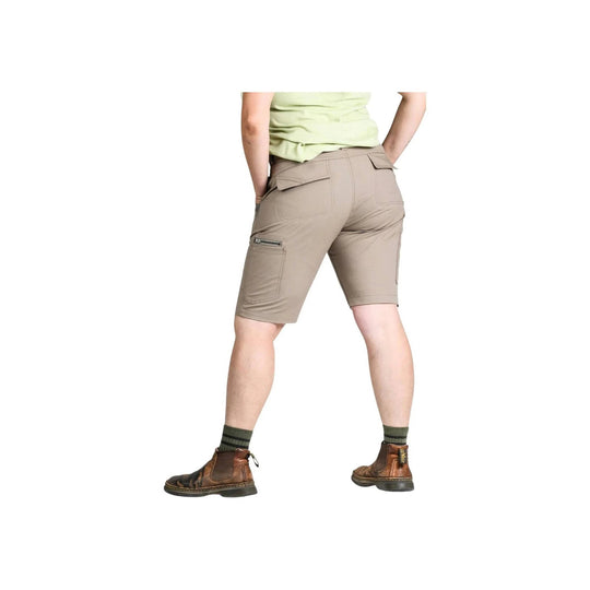 Khaki cargo shorts worn with boots, shown from the back