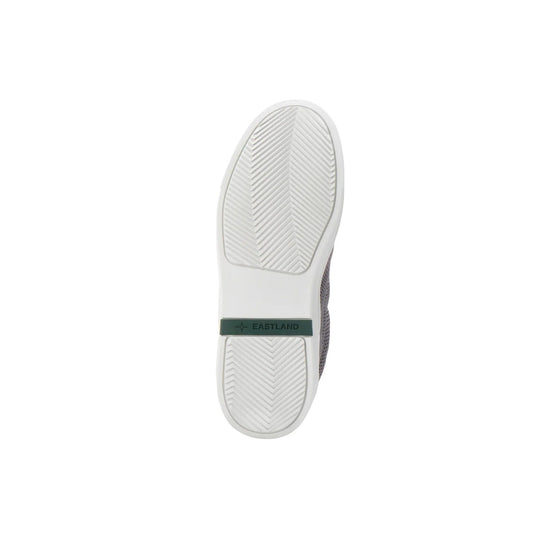 White sneaker outsole with herringbone tread and EASTLAND logo tab