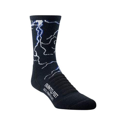 Black crew sock with white and blue lightning-like pattern and visible text on the ankle