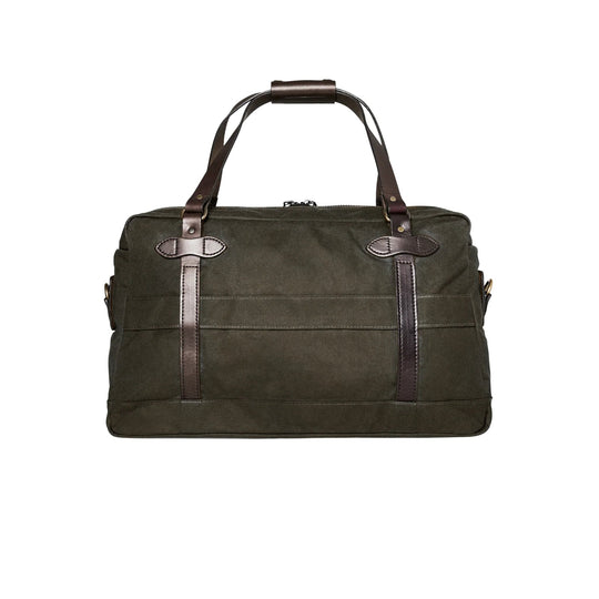 Olive canvas duffle bag with brown leather handles and trim